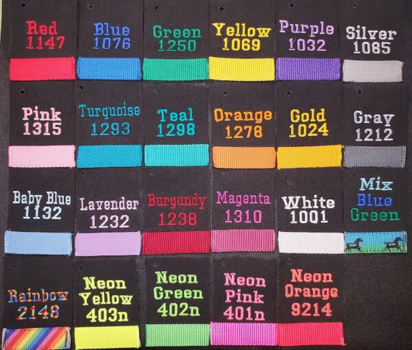 A bunch of different colors and numbers on some towels